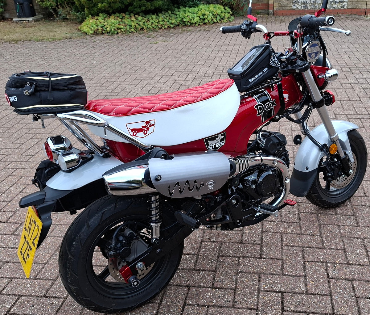 Red Honda Dax 125 with Red Diamond Seat cover with Dax dog embroidery - handmade by Cheeky Seats