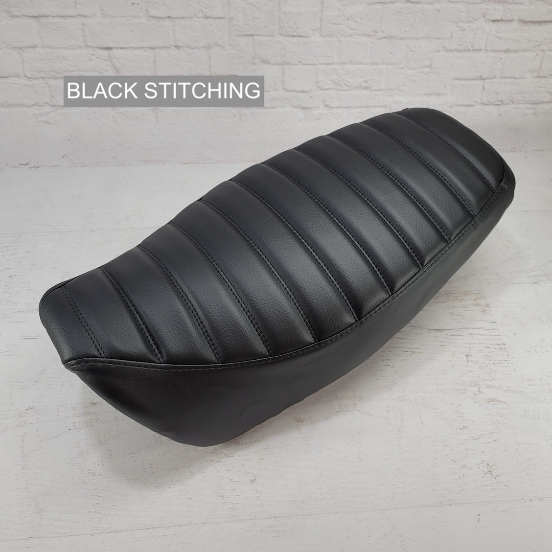 Black Honda Grom Seat Cover with tuck and roll stitching by Cheeky Seats