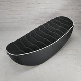 Black Alcantara suede Rayas Honda DAX 125 seat cover with white wave stitching and white piping, handmade by Cheeky Seats