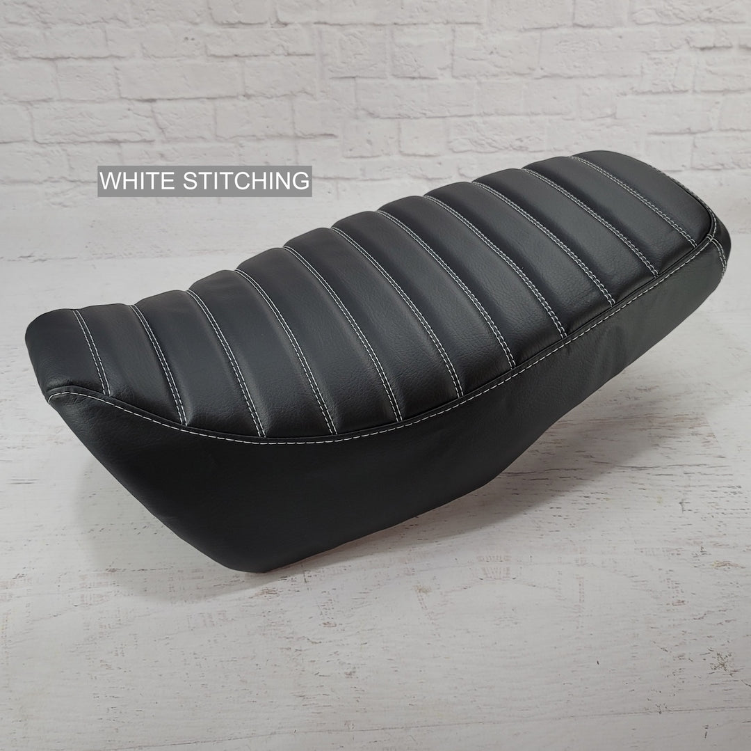 Black Honda Grom Seat Cover with minimalist tuck and roll stitching by Cheeky Seats