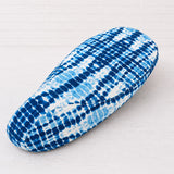 Shibori Tide scooter seat cover with an indigo-and-white tie-dye pattern for Vespa, Kymco, Honda and more, handmade by Cheeky Seats.