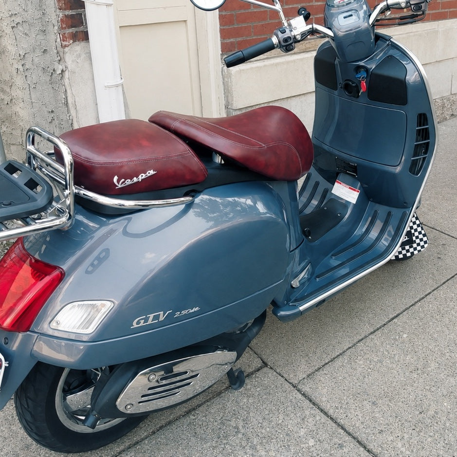 Blue Gray Vespa GTV with distressed oxblood seat cover with french seams by Cheeky Seats